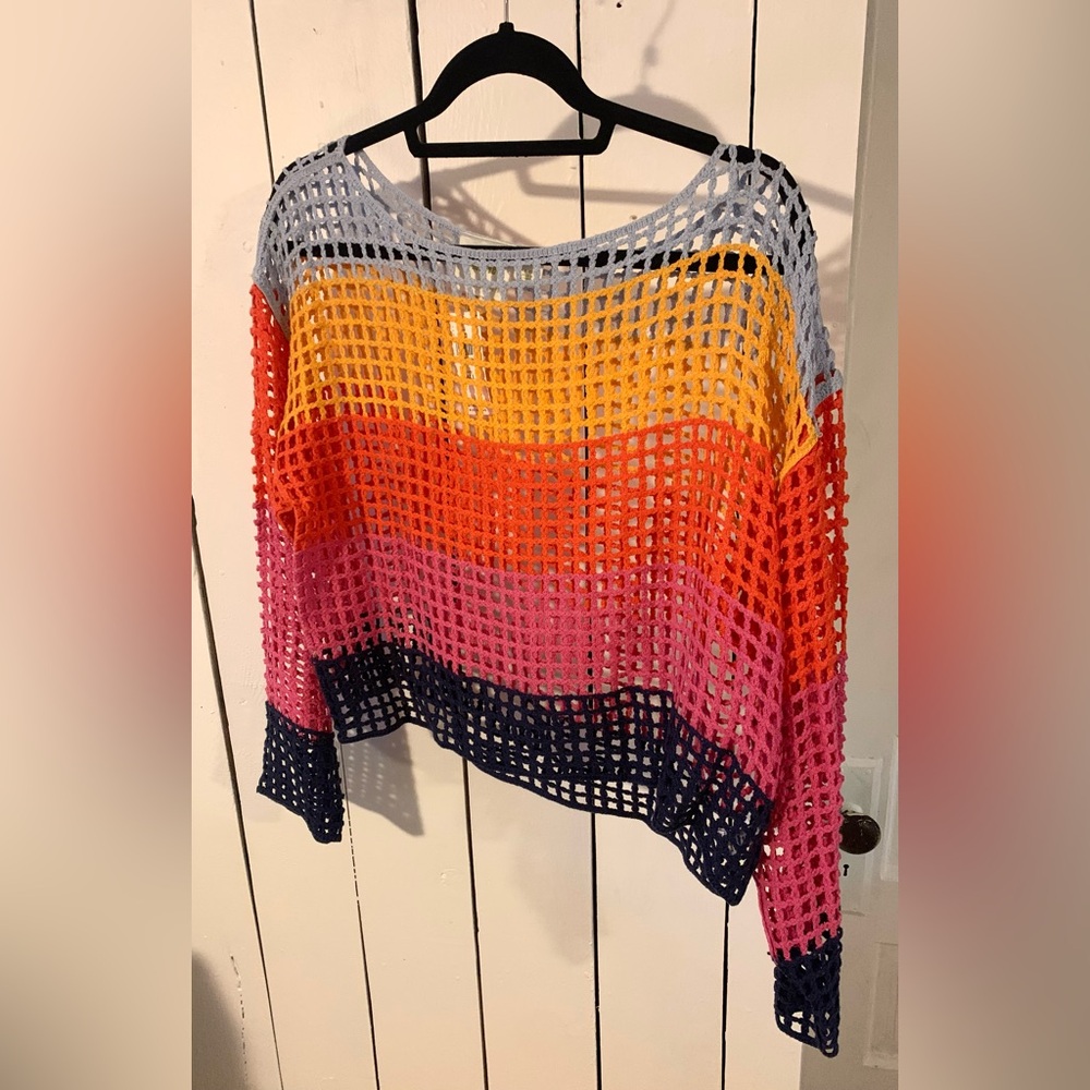 New with tags. Perfect cover up for the summer.
